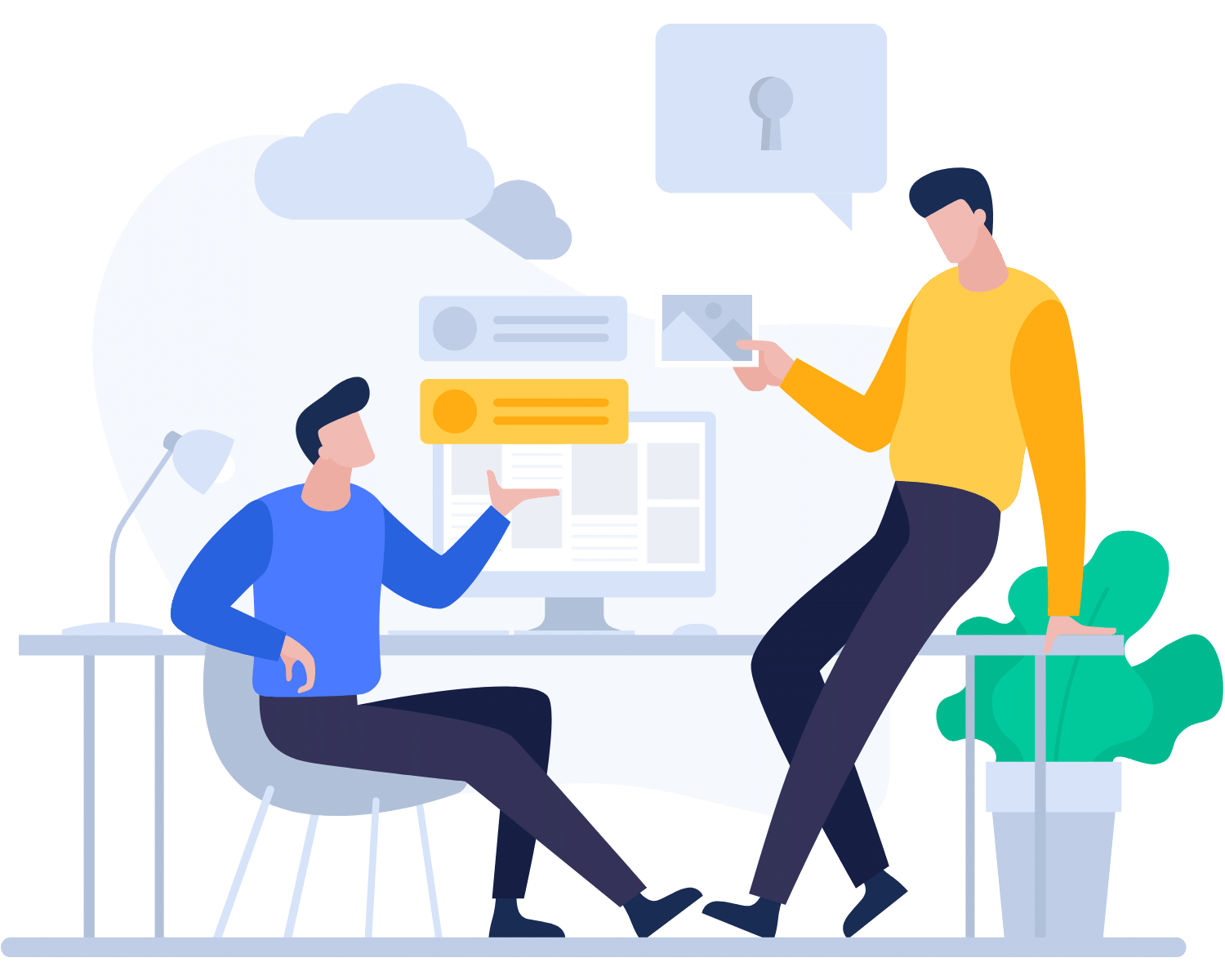 Two people chatting over a computer desk